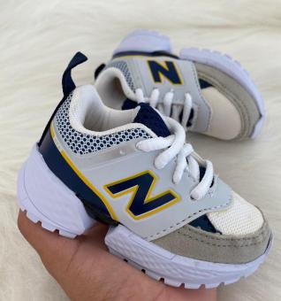 NEW BALANCE BABY BRANCO/MARINHO - Código 325-1